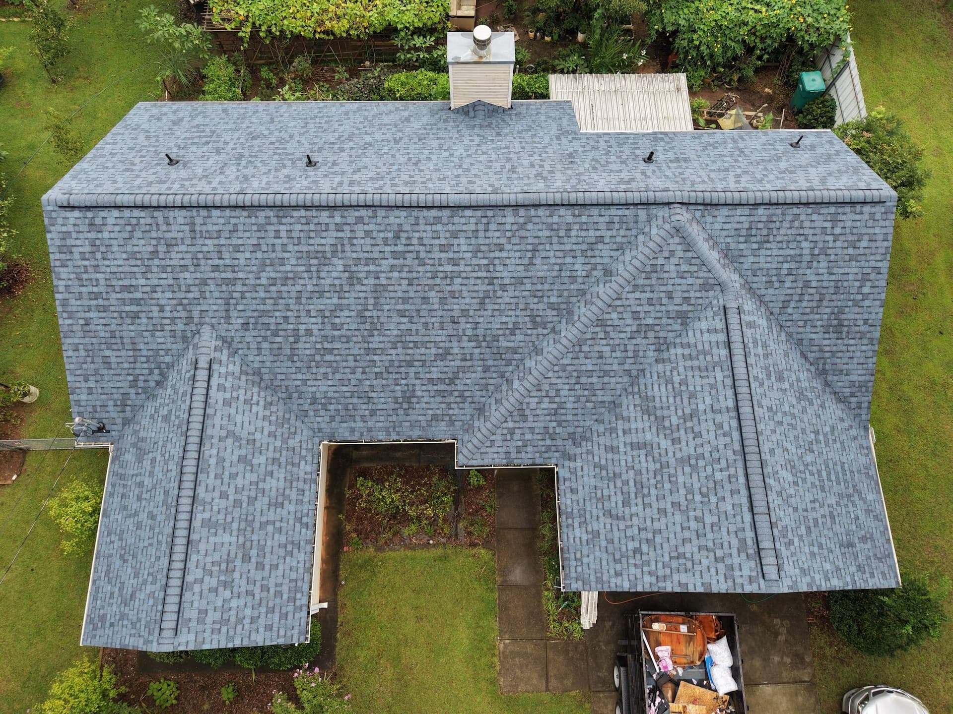 Aerial view of a new grey architectural shingle roof on a single-story Doylestown, PA home