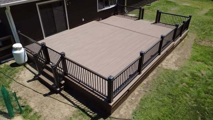 TimberTech composite deck with black railings in a Villanova, PA backyard